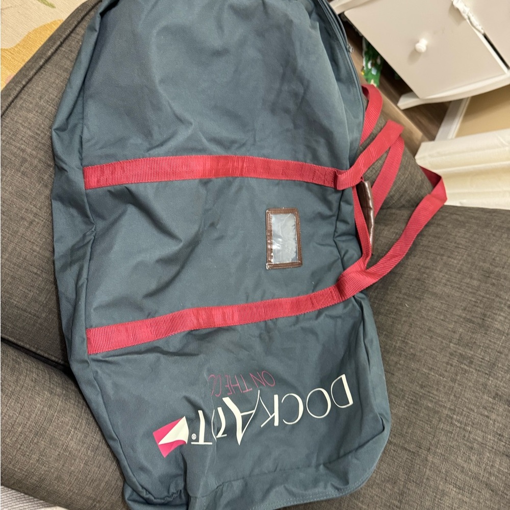 DockATot On The Go Bag with Red Straps